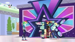 Size: 1280x720 | Tagged: safe, derpibooru import, screencap, desert sage, mile hill, orange sunrise, rainbow dash, waldo whereabout, zephyr breeze, equestria girls, equestria girls series, holidays unwrapped, spoiler:eqg series (season 2), background human, canterlot mall, cap, clothes, converse, dashing through the mall, female, geode of super speed, hat, magical geodes, male, no socks, pants, plusplus, shoes, skirt, sneakers, socks