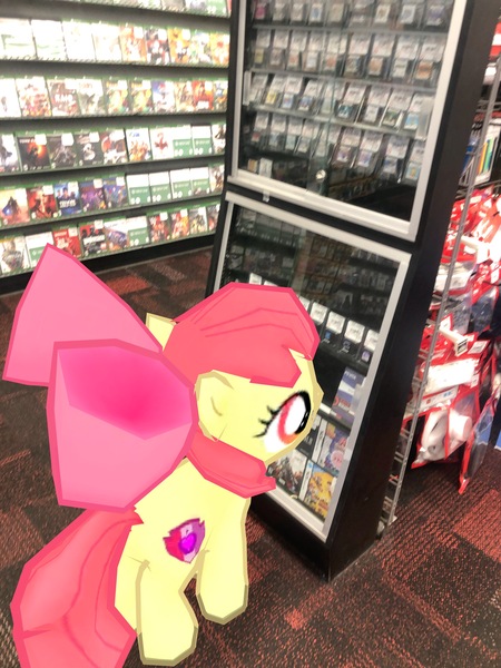 Size: 3024x4032 | Tagged: safe, derpibooru import, photographer:undeadponysoldier, apple bloom, earth pony, pony, augmented reality, female, filly, gameloft, gamestop, irl, nintendo ds, photo, ponies in real life