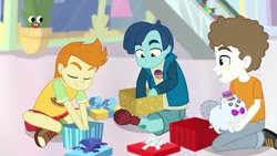 Size: 1280x720 | Tagged: safe, derpibooru import, screencap, gallop j. fry, henry handle, manestrum, super funk, equestria girls, equestria girls series, holidays unwrapped, spoiler:eqg series (season 2), clothes, crossed legs, eyes closed, kids, legs, male, pants, plusplus, present, shoes, smiling, sneakers, toy