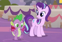 Size: 1060x720 | Tagged: safe, derpibooru import, screencap, spike, starlight glimmer, dragon, pony, unicorn, the last problem, arm behind back, claws, cute, female, male, mare, present, smiling, spikabetes, toes, underfoot, winged spike, wings