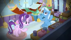 Size: 1600x900 | Tagged: safe, derpibooru import, screencap, starlight glimmer, trixie, pony, a horse shoe-in, blanket, book, box, broom, cape, chest, clothes, container, curtains, door, hammock, hat, jar, juggling, pillow, rug, smoke bomb, top hat, trixie's wagon, wand, window