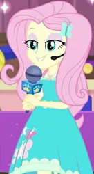 Size: 229x421 | Tagged: safe, derpibooru import, screencap, fluttershy, best in show: the victory lap, equestria girls, equestria girls series, spoiler:eqg series (season 2), cropped, eyeshadow, female, geode of fauna, headset, headset mic, lidded eyes, magical geodes, makeup, microphone, smiling, solo