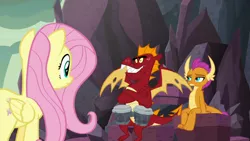 Size: 1920x1080 | Tagged: safe, derpibooru import, screencap, fluttershy, garble, smolder, dragon, pegasus, pony, sweet and smoky, bongos, crossed arms, dragoness, female, male, mare, rock, trio
