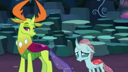 Size: 1366x768 | Tagged: cave of harmony, changedling, changeling, changeling king, deadpan expression, derpibooru import, displeased, duo, female, frown, horns, king thorax, lidded eyes, male, ocellus, safe, screencap, teenager, thorax, thorax is not amused, tree of harmony, uprooted