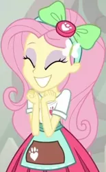 Size: 423x684 | Tagged: safe, derpibooru import, screencap, fluttershy, eqg summertime shorts, equestria girls, equestria girls series, good vibes, ^^, apron, bow, clothes, cropped, cute, daaaaaaaaaaaw, eyes closed, female, hairband, hairclip, happy, paw prints, pleated skirt, shirt, short sleeves, shyabetes, skirt, smiling, solo
