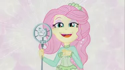 Size: 1280x720 | Tagged: safe, derpibooru import, screencap, fluttershy, equestria girls, equestria girls series, so much more to me, eyeshadow, lidded eyes, looking at you, makeup, open mouth, photo, singing, smiling, solo