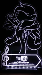 Size: 1152x2048 | Tagged: safe, artist:tridashie, derpibooru import, oc, oc:tridashie, unofficial characters only, pegasus, pony, clef, custom, illuminated, irl, photo, plaque, solo, spread wings, standing, text, toy, treble clef, wings, youtube