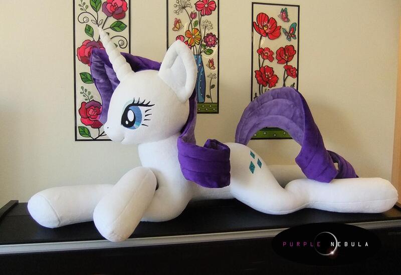 Size: 1280x879 | Tagged: safe, artist:purplenebulastudios, derpibooru import, rarity, pony, irl, life size, photo, plushie, prone, solo