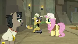 Size: 1920x1080 | Tagged: safe, derpibooru import, screencap, daring do, doctor caballeron, fluttershy, pony, daring doubt, dexterous hooves, hat, lantern, prone, truth talisman