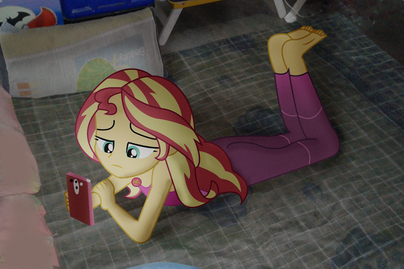 Size: 2100x1400 | Tagged: safe, derpibooru import, edit, sunset shimmer, equestria girls, barefoot, equestria girls in real life, feet, geode of empathy, irl, magical geodes, mobile phone, phone, photo, photoshop, pillow, sad, smartphone