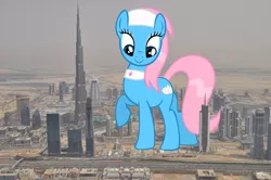 Size: 4288x2848 | Tagged: safe, derpibooru import, lotus blossom, pony, burj khalifa, city, dubai, female, giant lotus blossom, giant pony, giantess, highrise ponies, irl, macro, mega lotus blossom, photo, ponies in real life