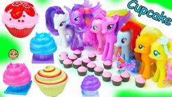 Size: 1280x720 | Tagged: safe, derpibooru import, applejack, fluttershy, pinkie pie, princess cadance, rainbow dash, rarity, twilight sparkle, twilight sparkle (alicorn), alicorn, earth pony, pegasus, pony, unicorn, candy, cupcake, doll, food, mane six, sweets, toy