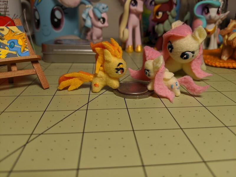 Size: 1249x937 | Tagged: safe, artist:tinyequine, derpibooru import, fluttershy, spitfire, pony, plushie, sarubobo