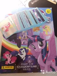 Size: 360x480 | Tagged: safe, derpibooru import, applejack, fluttershy, pinkie pie, rainbow dash, rarity, tempest shadow, twilight sparkle, twilight sparkle (alicorn), alicorn, mouse, pony, sea pony, unicorn, my little pony: the movie, avito, avito logo, book, canterlot castle, cyrillic, mane six, my little pony, my little pony logo, panini, russian, sticker, sticker book