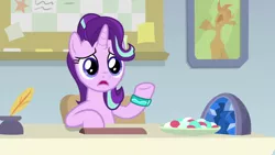 Size: 1920x1080 | Tagged: safe, derpibooru import, screencap, starlight glimmer, pony, unicorn, student counsel, bracelet, female, geode, inkwell, jewelry, mare, open mouth, quill, raised hoof, solo, starlight's office