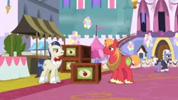 Size: 1366x768 | Tagged: safe, derpibooru import, screencap, big macintosh, earl grey, lemon hearts, mochaccino, rare find, savoir fare, earth pony, pony, unicorn, the last problem, background pony, balloon, banner, bow, carpet, crate, duo focus, female, flag, male, mare, stallion, table, tent