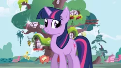 Size: 1280x720 | Tagged: safe, derpibooru import, screencap, twilight sparkle, pony, unicorn, balcony, beehive, cloud, door, fence, flower, golden oaks library, home, lantern, library, opening, ponyville, smiling, solo, sparkles, tree, treehouse, unicorn twilight, window