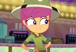 Size: 1573x1080 | Tagged: safe, derpibooru import, screencap, scootaloo, eqg summertime shorts, equestria girls, the canterlot movie club, cinema, cropped, cute, cutealoo, daring do costume, female, hand on hip, hat, pith helmet, smiling, solo