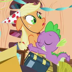Size: 1080x1080 | Tagged: safe, derpibooru import, screencap, applejack, spike, dragon, earth pony, pony, secret of my excess, baby, baby dragon, birthday, book, cropped, duo, embarrassed, eyes closed, female, floppy ears, freckles, golden oaks library, grateful, grin, hat, hug, male, mare, open mouth, party hat, ponytail, shipping fuel, smiling