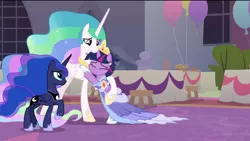 Size: 1920x1080 | Tagged: safe, derpibooru import, screencap, princess celestia, princess luna, twilight sparkle, twilight sparkle (alicorn), alicorn, pony, the last problem, balloon, big crown thingy 2.0, big crown thingy 3.0, bipedal, broach, clothes, coronation, coronation dress, crown, dress, eyes closed, hug, image, jewelry, messy mane, missing accessory, momlestia, momlestia fuel, png, raised leg, rearing, regalia, second coronation dress, squishy cheeks, stool, table