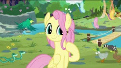 Size: 1920x1080 | Tagged: bird, bridge, butterfly, derpibooru import, duck, edit, edited screencap, flower, flower in hair, fluttershy, giraffe, happy, older, older fluttershy, raccoon, removed eyebag edit, river, safe, screencap, smiling, snake, solo, the last problem, tree