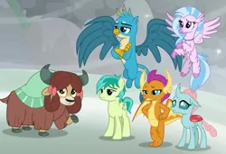 Size: 1281x875 | Tagged: safe, derpibooru import, screencap, gallus, ocellus, sandbar, silverstream, smolder, yona, changedling, changeling, classical hippogriff, dragon, earth pony, gryphon, hippogriff, pony, yak, the ending of the end, animation error, best friends, bow, cloven hooves, colored hooves, cropped, crossed arms, crossed legs, dragoness, female, flying, hair bow, hands on hip, horns, jewelry, lidded eyes, male, monkey swings, necklace, raised eyebrow, size difference, smiling, smugder, spread wings, student six, teenaged dragon, teenager, wings