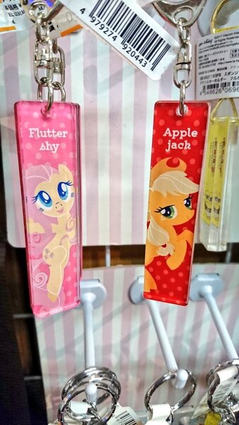 Size: 576x1024 | Tagged: applejack, derpibooru import, fluttershy, irl, keychain, photo, safe