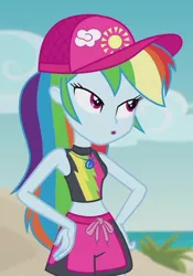 Size: 702x1004 | Tagged: safe, derpibooru import, screencap, rainbow dash, aww... baby turtles, equestria girls, equestria girls series, baseball cap, beach, beach babe, belly button, cap, clothes, cropped, female, geode of super speed, hands on hip, hat, magical geodes, midriff, shorts, sleeveless, solo, water