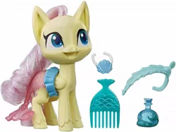 Size: 1067x800 | Tagged: safe, derpibooru import, fluttershy, mermaid, pegasus, pony, my little pony: pony life, brush, brushable, doll, female, first my little pony: pony life picture on derpibooru, hasbro, irl, it begins, mare, merchandise, photo, pony history, reveal the magic, toy