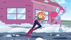 Size: 1600x900 | Tagged: safe, derpibooru import, screencap, pinkie pie, sunset shimmer, equestria girls, equestria girls series, holidays unwrapped, spoiler:eqg series (season 2), female, house, jumping, ramekin, running, saving pinkie's pie, snow, souffle, window, winter