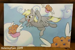 Size: 3736x2475 | Tagged: safe, artist:helicityponi, derpibooru import, derpy hooves, pegasus, pony, cloud, female, flying, food, irl, mare, muffin, photo, solo, traditional art