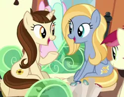 Size: 357x282 | Tagged: safe, derpibooru import, screencap, dawnlighter, goldy wings, roseluck, tender brush, winter lotus, pegasus, pony, unicorn, the last problem, background pony, cropped, duo focus, female, friendship student, looking at each other, mare, open mouth, raised hoof, sitting