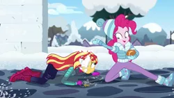 Size: 1280x720 | Tagged: safe, derpibooru import, screencap, pinkie pie, sunset shimmer, equestria girls, equestria girls series, holidays unwrapped, spoiler:eqg series (season 2), boots, clothes, duo, duo female, female, key, keychain, ramekin, saving pinkie's pie, shoes, snow, snow fort, snowball fight, souffle, winter outfit