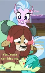 Size: 319x522 | Tagged: safe, derpibooru import, edit, edited screencap, screencap, sandbar, silverstream, yona, hippogriff, pony, yak, school raze, bedroom, blush sticker, blushing, bow, caption, chat, cloven hooves, cropped, female, hair bow, hair over one eye, happy, just kiss already, looking at each other, lying down, male, monkey swings, shipper on deck, shipping, straight, trio, yonabar
