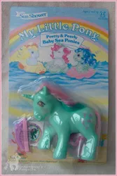 Size: 408x610 | Tagged: beachcomber (g1), bow, comb, derpibooru import, fizzy, mane bow, official, packaging, photographer:einhornbaby, pretty and pearly baby sea ponies, ripple (g1), safe, sea pony, surf rider, toy, you had one job