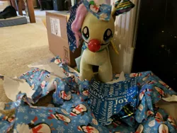 Size: 4032x3024 | Tagged: safe, derpibooru import, photographer:joeydr, fluttershy, pony, build-a-bear, irl, photo, plushie, rudolph nose, wrapping paper