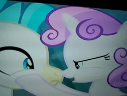 Size: 4160x3120 | Tagged: safe, derpibooru import, screencap, sweetie belle, terramar, hippogriff, pony, seapony (g4), unicorn, surf and/or turf, angry eyes, determined, discovery family logo, female, happy, hoof on face, looking at each other, male, photo, picture of a screen, seaponified, seapony sweetie belle, species swap
