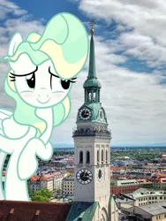 Size: 1800x2400 | Tagged: safe, artist:slb94, derpibooru import, vapor trail, pegasus, pony, blushing, building, church, female, giant pony, giantess, highrise ponies, irl, macro, mare, munich, photo, ponies in real life, raised hoof, solo