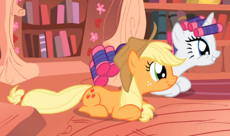 Size: 843x497 | Tagged: safe, derpibooru import, screencap, applejack, rarity, twilight sparkle, earth pony, pony, unicorn, look before you sleep, applejack's hat, cowboy hat, cropped, cute, duo, female, freckles, golden oaks library, hair curlers, hat, jackabetes, mare, prone, raribetes, smiling, unicorn twilight, wide eyes