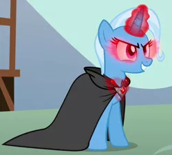 Size: 682x614 | Tagged: safe, derpibooru import, trixie, pony, unicorn, magic duel, alicorn amulet, cloak, clothes, controlled, corrupted, cropped, dark magic, evil grin, female, glowing eyes, glowing horn, grin, horn, magic, mare, red eyes, smiling