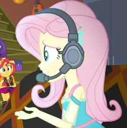 Size: 1072x1080 | Tagged: safe, derpibooru import, screencap, fluttershy, rarity, sunset shimmer, costume conundrum, equestria girls, equestria girls series, spoiler:choose your own ending (season 2), spoiler:eqg series (season 2), cropped, female, gamershy, geode of empathy, geode of fauna, headset, magical geodes, offscreen character, solo focus, stairs, sunset's apartment, worried