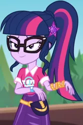 Size: 560x841 | Tagged: safe, derpibooru import, screencap, sci-twi, twilight sparkle, equestria girls, equestria girls series, sunset's backstage pass!, spoiler:eqg series (season 2), clothes, collar, cropped, cute, female, forest, forest background, geode of telekinesis, glasses, hairclip, lidded eyes, logo, magical geodes, music festival outfit, ponytail, pouch, shirt, short sleeves, skirt, smiling, twiabetes, wrist wraps