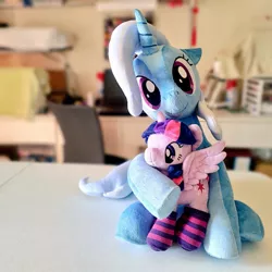 Size: 1024x1024 | Tagged: safe, artist:nekokevin, derpibooru import, trixie, twilight sparkle, twilight sparkle (alicorn), alicorn, pony, unicorn, 4de, clothes, duo, female, floppy ears, hug, irl, looking at you, mare, photo, plushie, raised hoof, sitting, size difference, smiling, socks, spread wings, striped socks, underhoof, wings