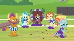 Size: 1920x1080 | Tagged: safe, derpibooru import, screencap, lighthoof, ocellus, shimmy shake, smolder, yona, changedling, changeling, dragon, earth pony, pony, yak, 2 4 6 greaaat, angry, buckball field, cheerleader, cheerleader ocellus, cheerleader outfit, cheerleader smolder, cheerleader yona, claws, clothes, confetti, crossed arms, curved horn, dragoness, embarrassed, failure, female, hay bale, horn, horns, looking down, looking to side, monkey swings, pleated skirt, pom pom, sad, sitting, skirt, smolder is not amused, teenaged dragon, teenager, unamused