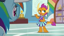 Size: 1920x1080 | Tagged: safe, derpibooru import, screencap, rainbow dash, smolder, dragon, pegasus, pony, 2 4 6 greaaat, cheerleader, cheerleader outfit, cheerleader smolder, claws, clothes, coach rainbow dash, coaching cap, confused, cute, displeased, dragoness, duo, fangs, female, gym, horns, looking up, mare, open mouth, pleated skirt, raised arm, rant, skirt, smolder is not amused, smolderbetes, teacher and student, teenaged dragon, teenager, thinking, toes, trophy, unamused