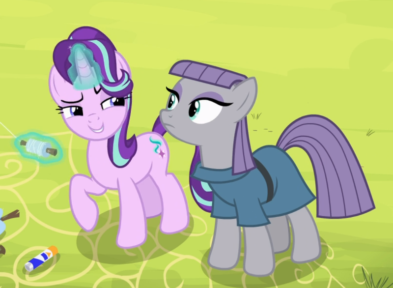 Size: 1047x767 | Tagged: safe, derpibooru import, screencap, maud pie, starlight glimmer, earth pony, pony, unicorn, rock solid friendship, bonding, clothes, cropped, cute, duo, emotionless, eyeshadow, female, frown, glowing horn, glue stick, grin, horn, kite, kite flying, lidded eyes, looking at each other, magic, makeup, mare, narrowed eyes, raised eyebrow, raised hoof, smiling, telekinesis