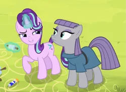 Size: 1047x767 | Tagged: safe, derpibooru import, screencap, maud pie, starlight glimmer, earth pony, pony, unicorn, rock solid friendship, bonding, clothes, cropped, cute, duo, emotionless, eyeshadow, female, frown, glowing horn, glue stick, grin, horn, kite, kite flying, lidded eyes, looking at each other, magic, makeup, mare, narrowed eyes, raised eyebrow, raised hoof, smiling, telekinesis