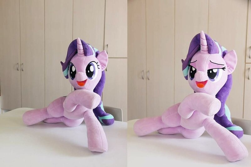 Size: 1024x682 | Tagged: safe, artist:nekokevin, derpibooru import, starlight glimmer, pony, unicorn, series:nekokevin's glimmy, female, irl, lidded eyes, lying down, mare, open mouth, photo, plushie, raised hoof, smiling, solo, underhoof