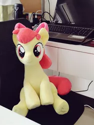 Size: 768x1024 | Tagged: safe, artist:nekokevin, derpibooru import, apple bloom, earth pony, pony, adorabloom, bow, chair, computer, cute, female, filly, hair bow, irl, laptop computer, looking at you, photo, plushie, sitting, smiling, solo, table, underhoof