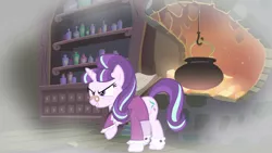 Size: 1280x720 | Tagged: a hearth's warming tail, book, cauldron, derpibooru import, fireplace, safe, screencap, snowfall frost, solo, starlight glimmer